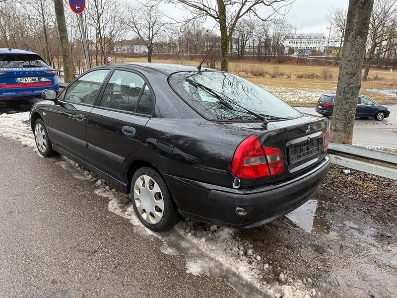 Schwarz Gebraucht 2003 Mitsubishi Carisma Top Limousine | 500 € (Superpreis) - Bild 1/4