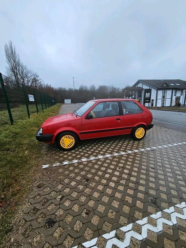 Gebraucht Nissan Micra 50 PS (36 kW) 1988 Rot Kleinwagen