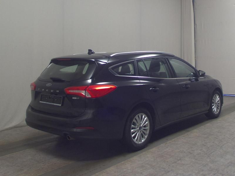 Gebraucht Ford Focus Titanium 125 PS (91 kW) 2021 Obsidianschwarz metallic Kombi