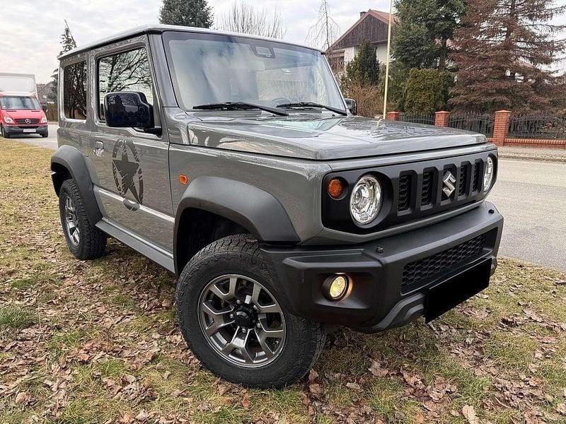 Grau Gebraucht 2019 Suzuki Jimny Comfort+ SUV | 22.500 € (Superpreis) - Bild 1/4
