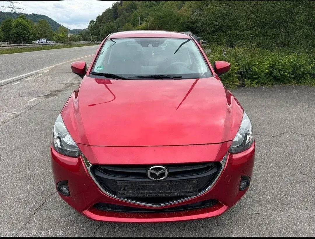 Gebraucht Mazda 2 Exclusive-Line 90 PS (66 kW) 2016 Rot Kleinwagen
