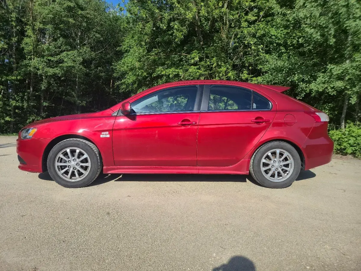 Gebraucht Mitsubishi Lancer 143 PS (105 kW) 2010 Rot Limousine