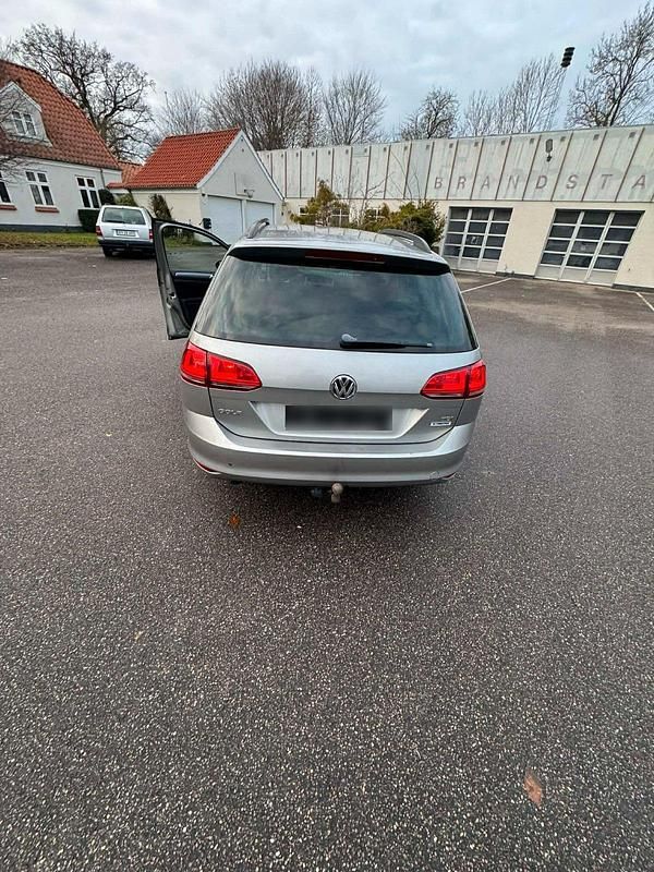 Second-hand VW Golf VII 105 CP (77 kW) 2014 Argintiu Break