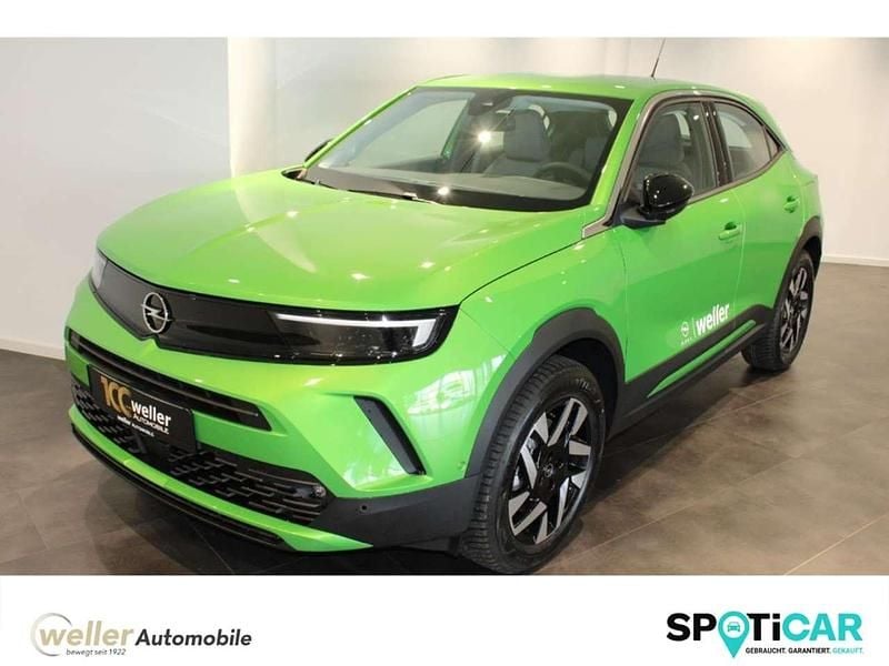 Matchagrünmetallic Gebraucht 2025 Opel Mokka-e Elegance SUV | 28.880 € (Guter Preis) - Bild 1/4