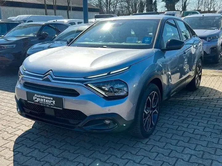 Grau Gebraucht 2022 Citroën e-C4 Feel Limousine | 17.950 € (Guter Preis) - Bild 1/4