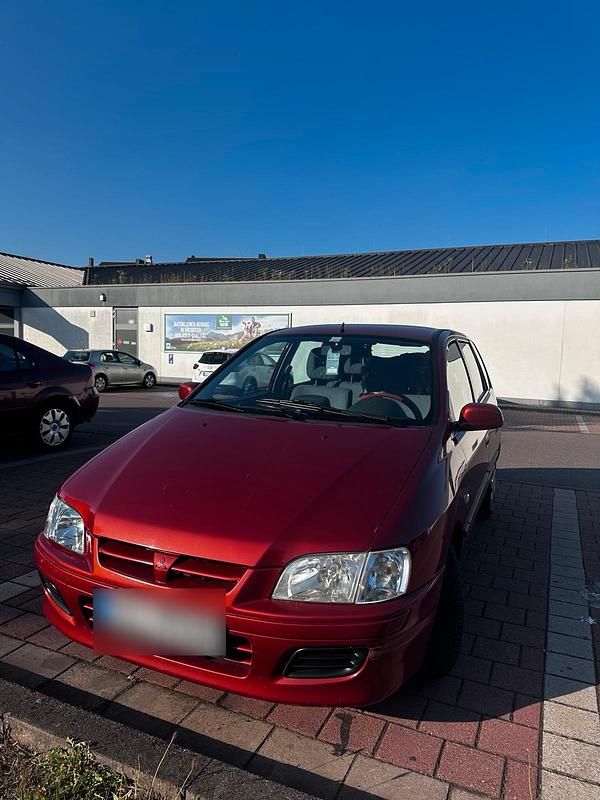 Gebraucht Mitsubishi Space Star 82 PS (60 kW) 2002 Rot Van / Kleinbus