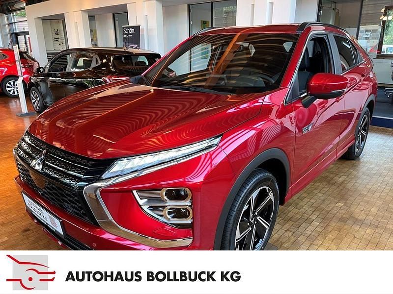 Dynamik rot (d) Neu 2024 Mitsubishi Eclipse Cross Plus SUV | 32.990 € - Bild 1/4