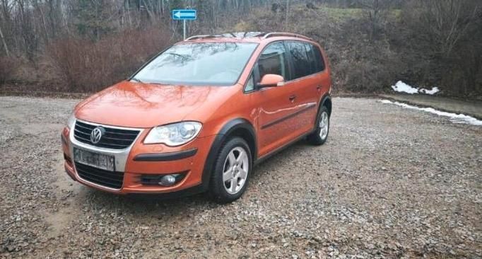 Orange Gebraucht 2008 VW Touran Cross Van / Kleinbus | 6.899 € (Fairer Preis) - Bild 1/4