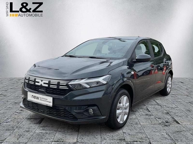 Kometengrau (metallic) Gebraucht 2023 Dacia Sandero Expression Kleinwagen | 14.980 € (Guter Preis) - Bild 1/4