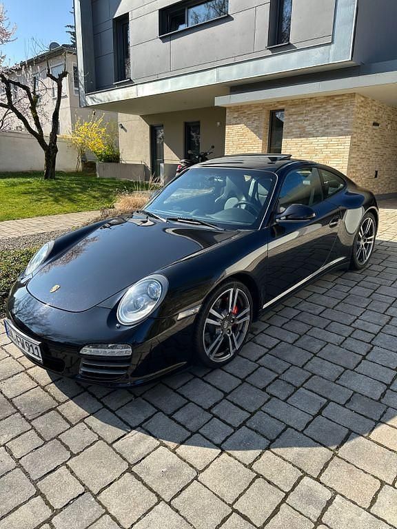 Schwarz Gebraucht 2010 Porsche 997 Coupé | 62.500 € (Superpreis) - Bild 1/4