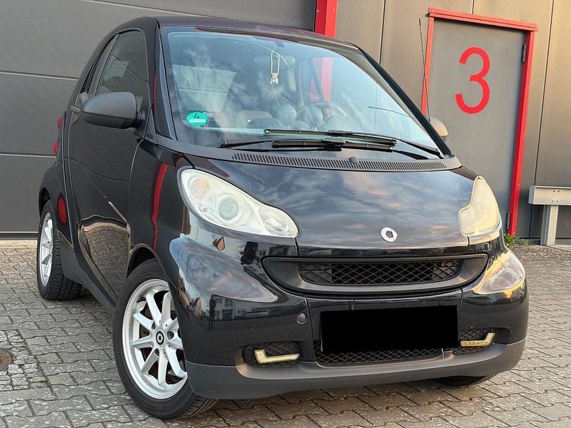 Gebraucht Smart ForTwo Coupé 61 PS (44 kW) 2012 Schwarz Coupé