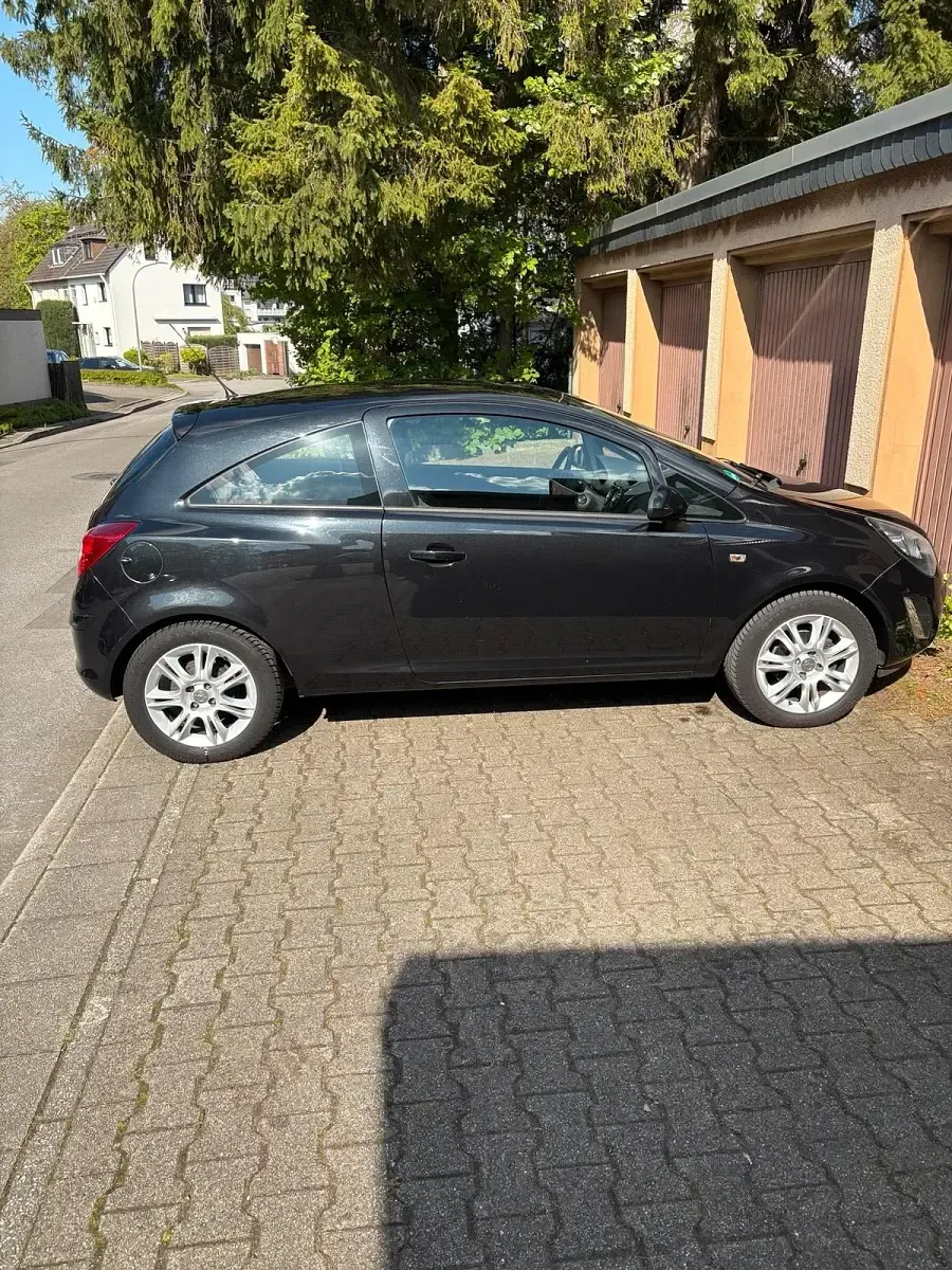 Gebraucht Opel Corsa 101 PS (74 kW) 2013 Schwarz Kleinwagen