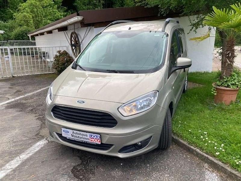 Titangrau metallic Gebraucht 2017 Ford Tourneo Courier Titanium Van / Kleinbus | 12.790 € (Teuer) - Bild 1/4