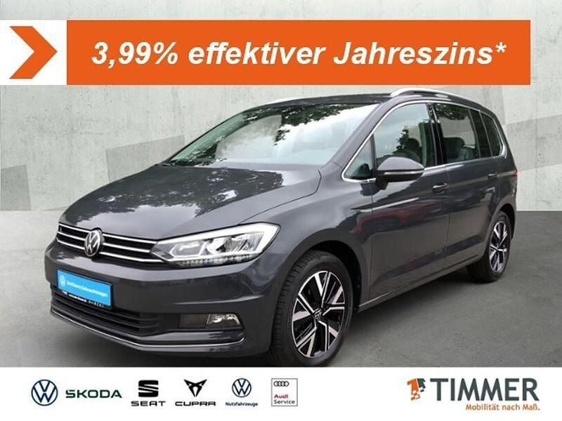 Grau Gebraucht 2022 VW Touran Highline Van / Kleinbus | 27.549 € (Superpreis) - Bild 1/4
