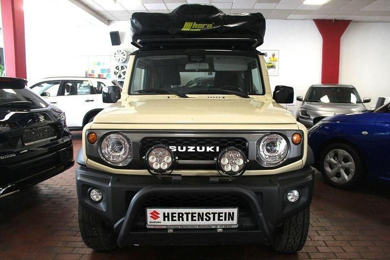 Beige Gebraucht 2020 Suzuki Jimny Comfort+ SUV | 34.800 € (Teuer) - Bild 1/4