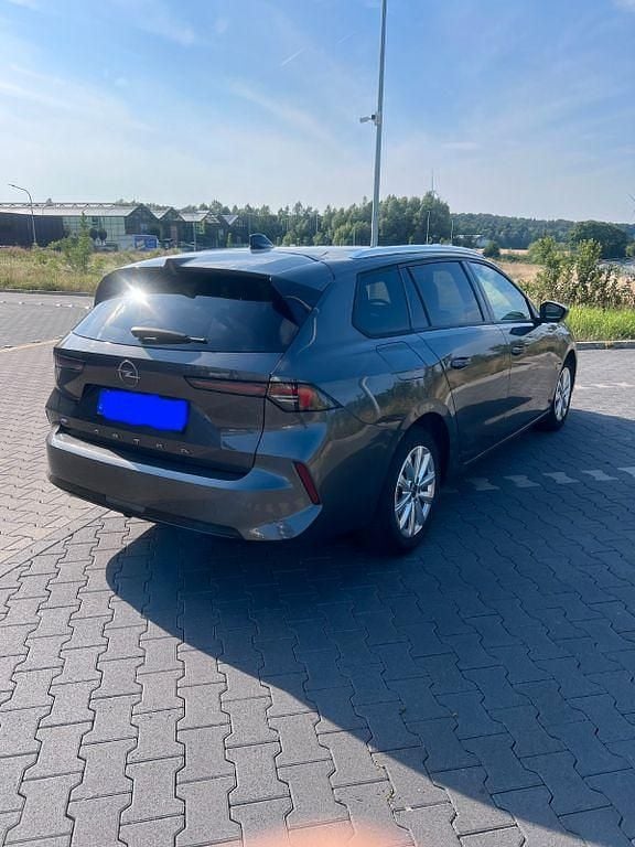 Grau Gebraucht 2023 Opel Astra Edition Kombi | 18.800 € (Superpreis) - Bild 1/4
