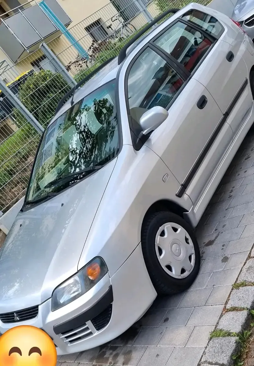 Gebraucht Mitsubishi Space Star 97 PS (71 kW) 2004 Silber Van / Kleinbus