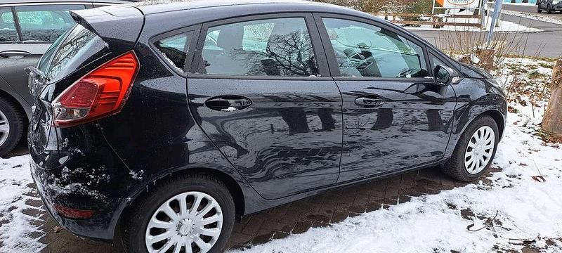 Gebraucht Ford Fiesta Trend 82 PS (60 kW) 2014 Pantherschwarz metallic Kleinwagen
