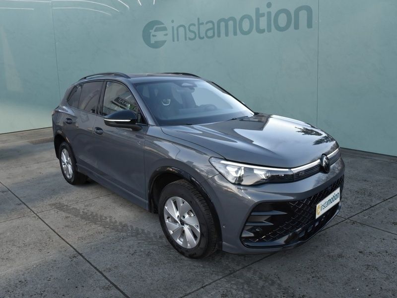 Grau Gebraucht 2024 VW Tiguan R-line SUV | 47.640 € (Superpreis) - Bild 1/4