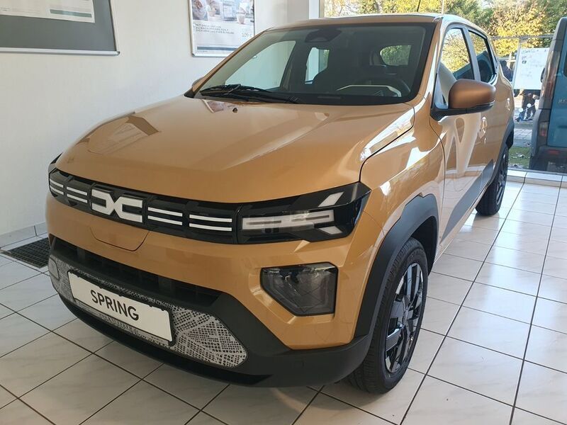 Beige Neu 2024 Dacia Spring Extreme Kleinwagen | 15.890 € (Superpreis) - Bild 1/4