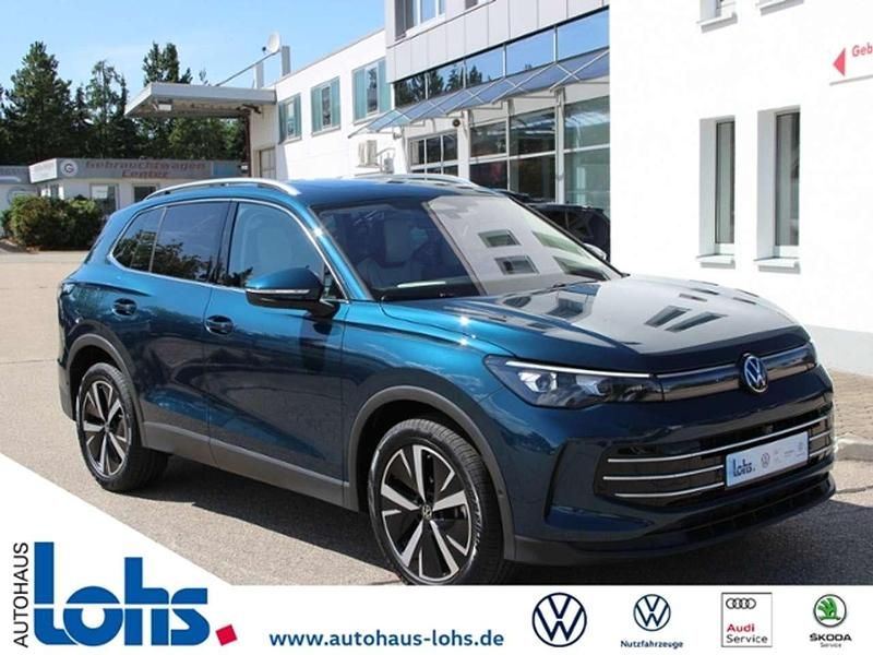 Nightshade blue metallic Gebraucht 2024 VW Tiguan Elegance SUV | 45.979 € - Bild 1/4