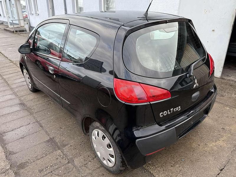 Gebraucht Mitsubishi Colt Inform 75 PS (55 kW) 2005 Cosmosschwarz Kleinwagen