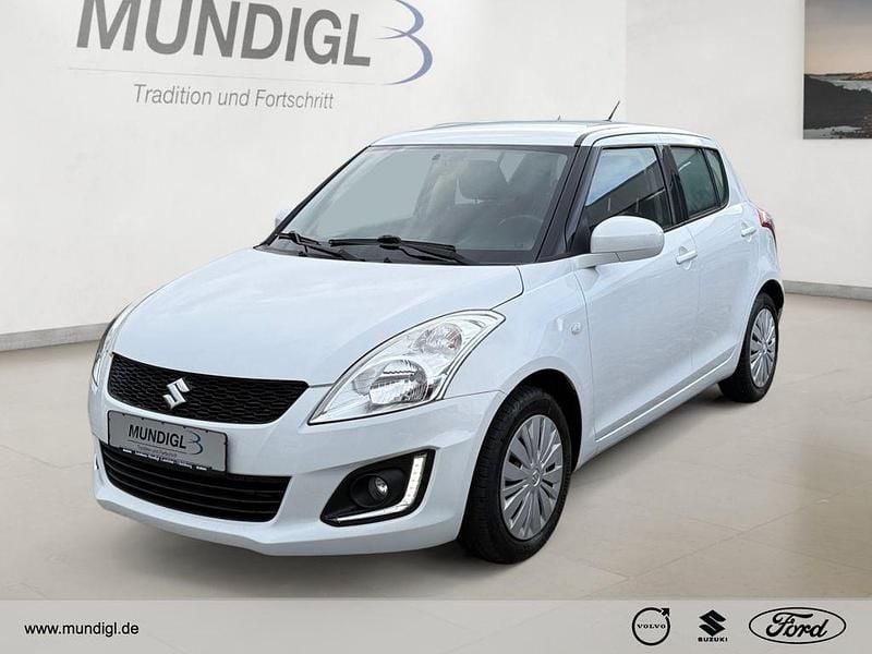 Weiss Gebraucht 2015 Suzuki Swift Club Limousine | 7.210 € (Guter Preis) - Bild 1/4