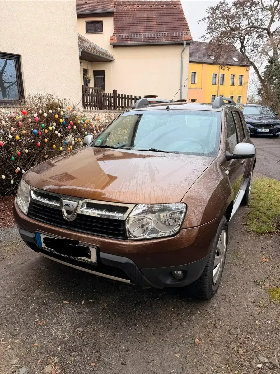 Używany Dacia Duster 105 KM (77 kW) 2011 Brązowy SUV