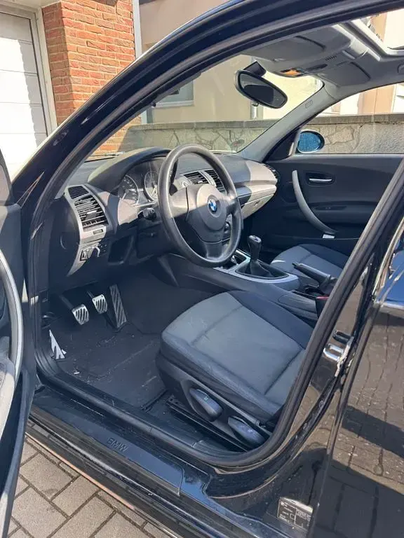Second-hand BMW 116 122 CP (89 kW) 2006 Negru Hatchback
