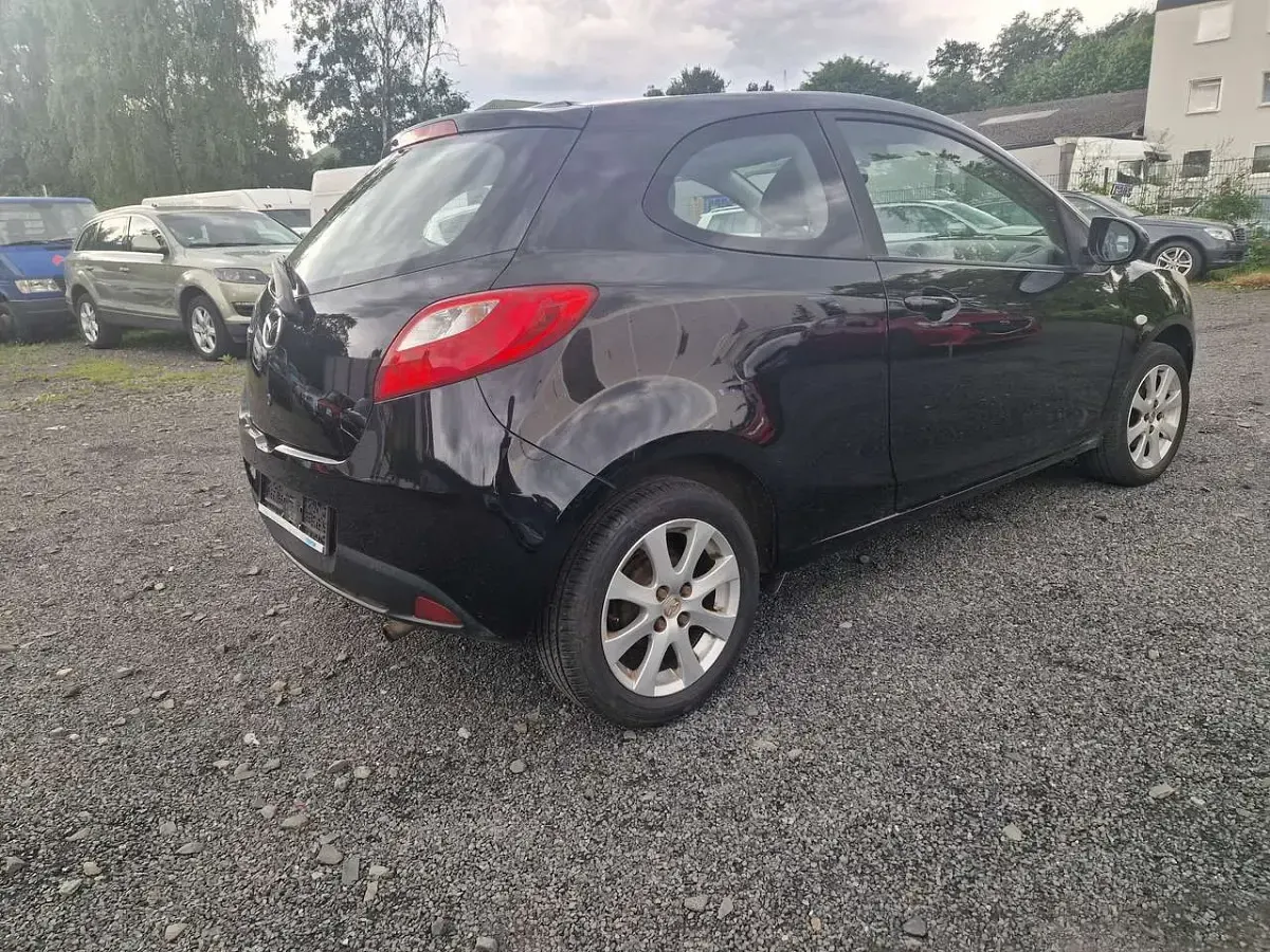 Gebraucht Mazda 2 Active 84 PS (61 kW) 2011 Brillantschwarz Kleinwagen