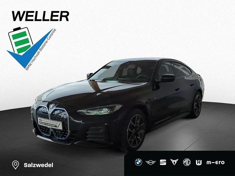 Black sapphire (schwarz) Gebraucht 2024 BMW i4 Efficient Dynamics Limousine | 45.390 € (Superpreis) - Bild 1/4
