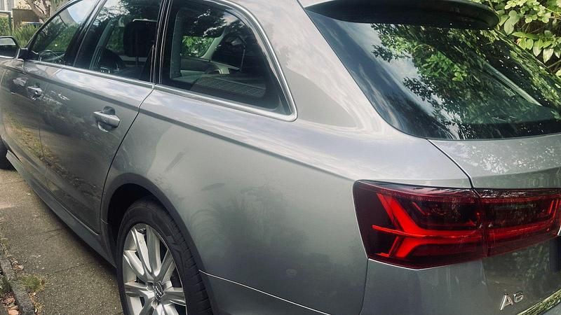 Second-hand Audi A6 Business 320 CP (235 kW) 2016 Gri Break