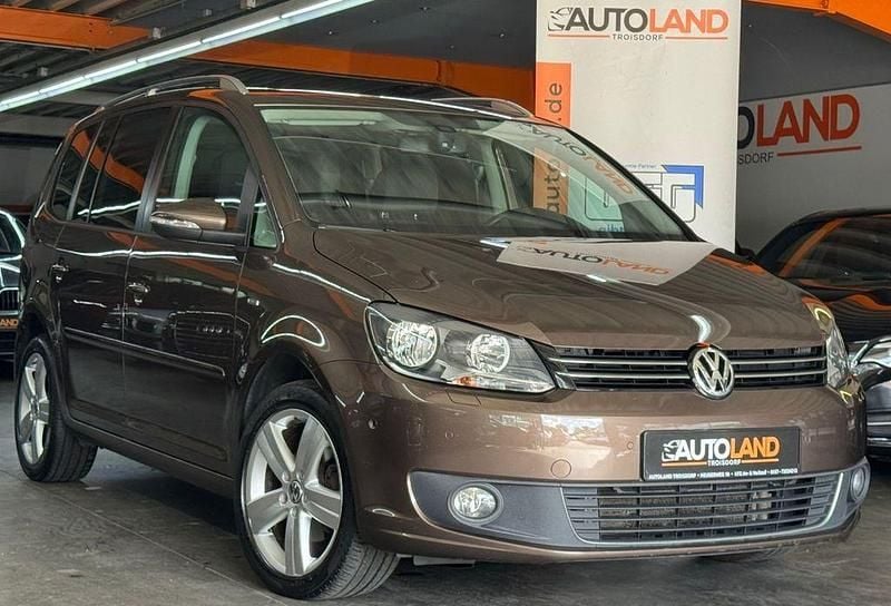Braun Gebraucht 2013 VW Touran Life Van / Kleinbus | 10.999 € (Fairer Preis) - Bild 1/4