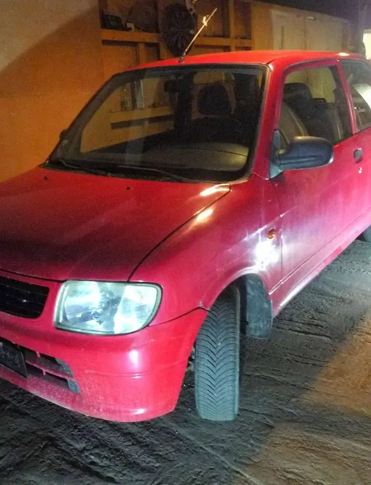 Gebraucht Daihatsu Cuore 56 PS (41 kW) 2001 Rot Kleinwagen