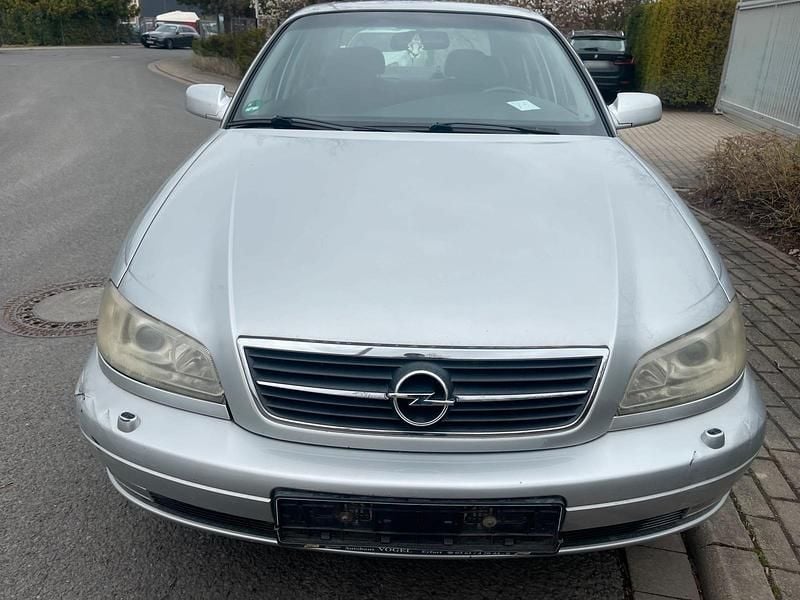 Second-hand Opel Omega 170 CP (125 kW) 2000 Argintiu Berlinǎ