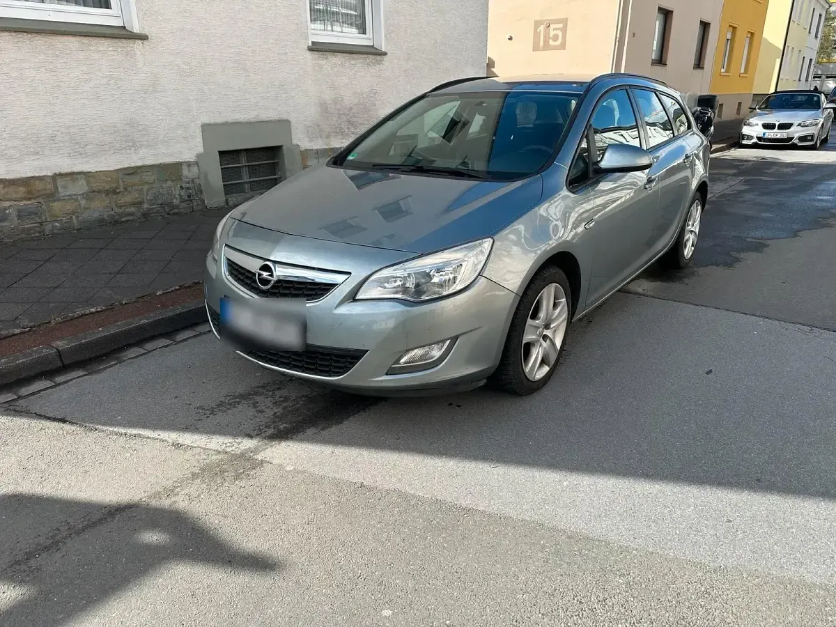 Usata Opel Astra 110 CV (80 kW) 2011 Grigio Station wagon