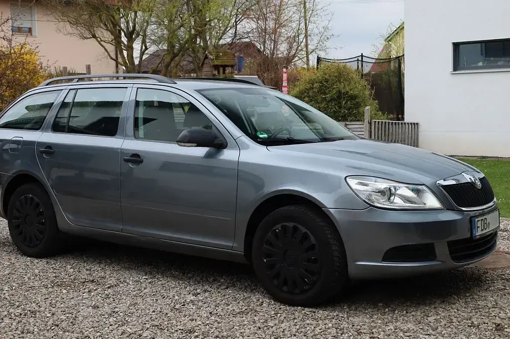 Używany Skoda Octavia 122 KM (89 kW) 2012 Srebrny Kombi