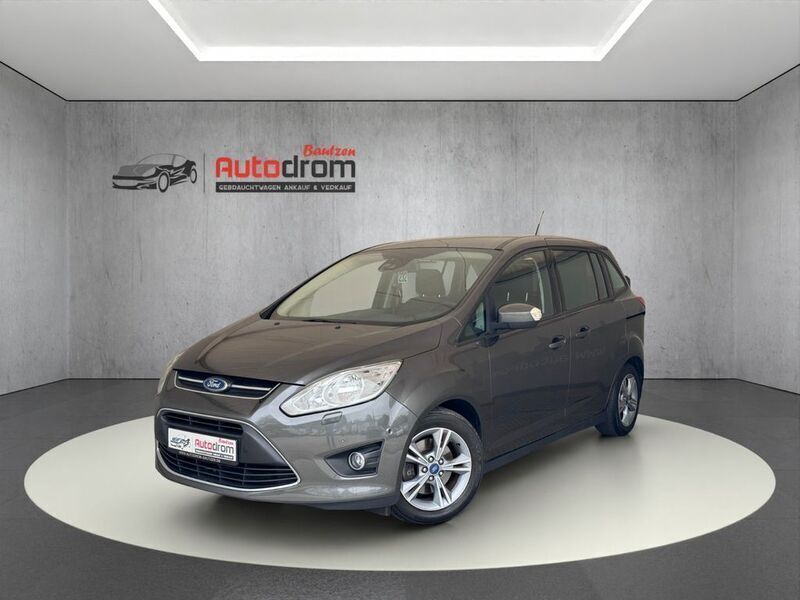 Grau Gebraucht 2015 Ford Grand C-Max Business Edition Van / Kleinbus | 9.999 € (Fairer Preis) - Bild 1/4