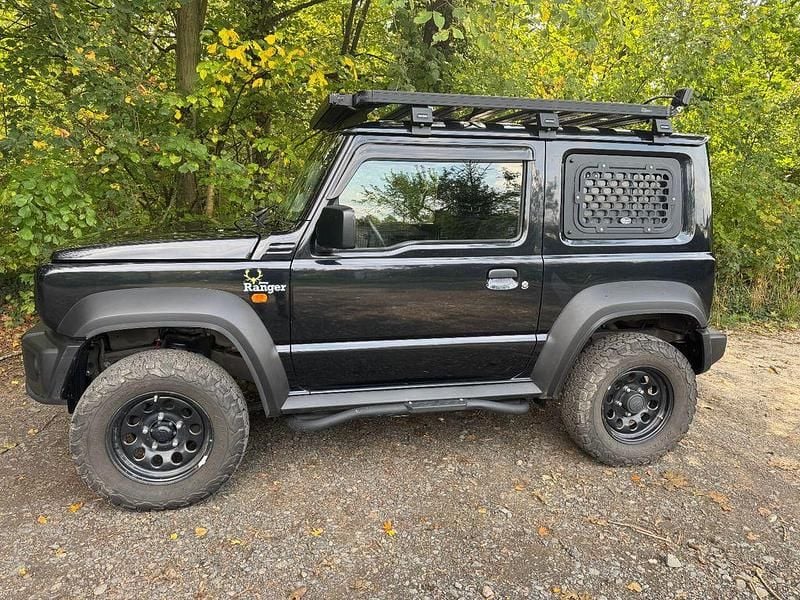Schwarz Gebraucht 2021 Suzuki Jimny Comfort SUV | 25.500 € (Fairer Preis) - Bild 1/4