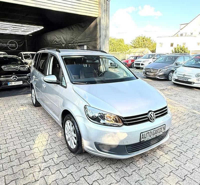 Silber Gebraucht 2014 VW Touran Comfortline Van / Kleinbus | 10.490 € (Fairer Preis) - Bild 1/4