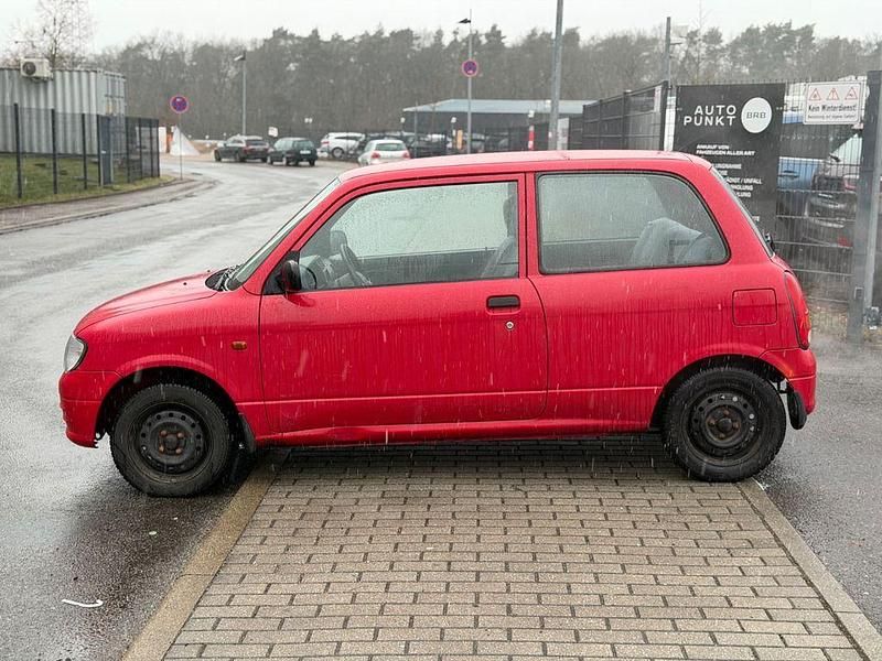 Gebraucht Daihatsu Cuore 56 PS (41 kW) 2000 Rot Kleinwagen