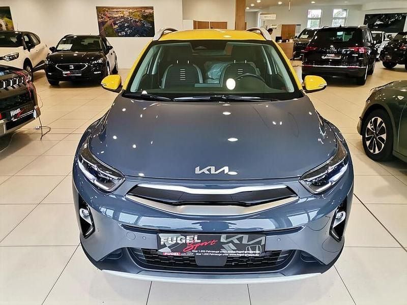 Gebraucht Kia Stonic Spirit 120 PS (88 kW) 2021 (mpr) perennialgrau met./gelb SUV