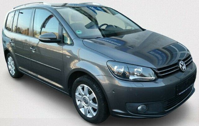 Gebraucht VW Touran Life 105 PS (77 kW) 2013 Grau metallic Van / Kleinbus