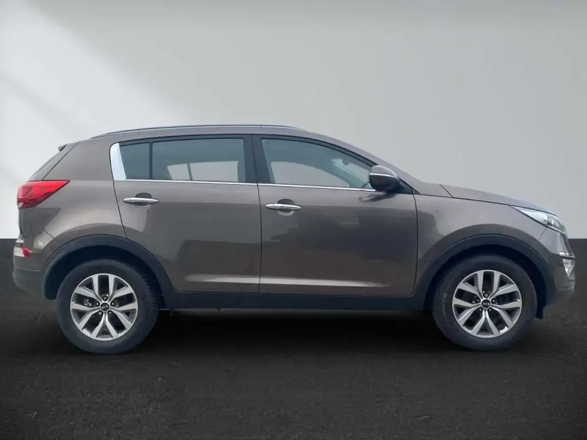 Gebraucht Kia Sportage Vision 135 PS (99 kW) 2015 (d5u) sand track m SUV