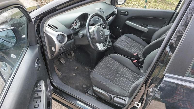 Gebraucht Mazda 2 75 PS (55 kW) 2009 Schwarz Kleinwagen