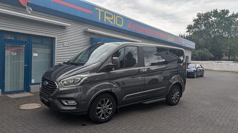 Grau Gebraucht 2022 Ford Transit Tourneo Titanium Van / Kleinbus | 43.950 € - Bild 1/4