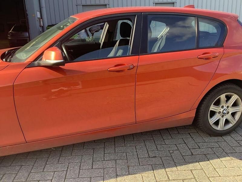 Gebraucht BMW 118 143 PS (105 kW) 2014 Orange Kleinwagen