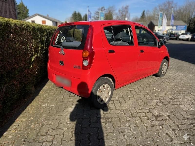 Gebraucht Daihatsu Cuore 69 PS (50 kW) 2011 Rot Kleinwagen