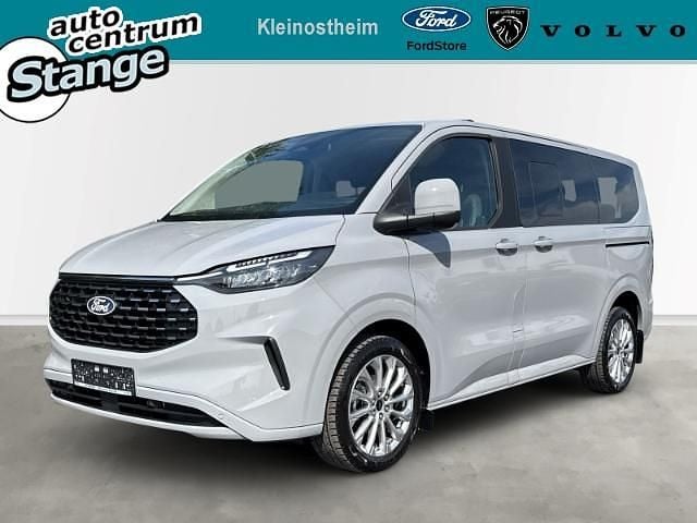 Grau Gebraucht 2024 Ford Tourneo Custom Titanium Van / Kleinbus | 57.900 € - Bild 1/4
