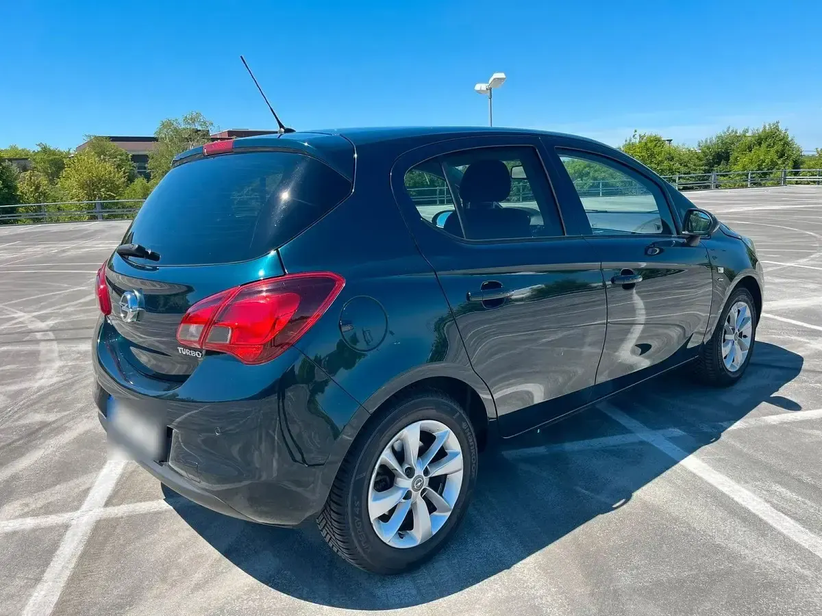 Gebraucht Opel Corsa drive 101 PS (74 kW) 2016 Grün Kleinwagen